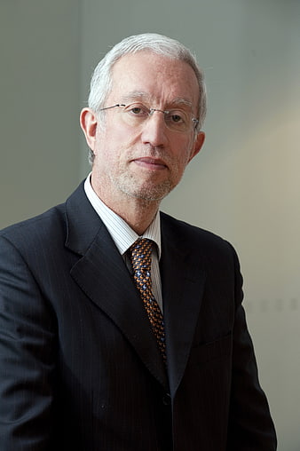 Professional Portrait of Senior Male Lawyer in Dark Suit