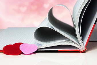 Open Notebook With Heart-Shaped Pages And Felt Hearts