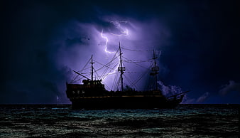 Silhouette of Pirate Ship in Stormy Sea with Lightning