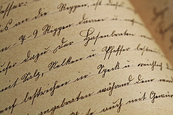 Close-up of vintage Sütterlin handwriting on aged paper