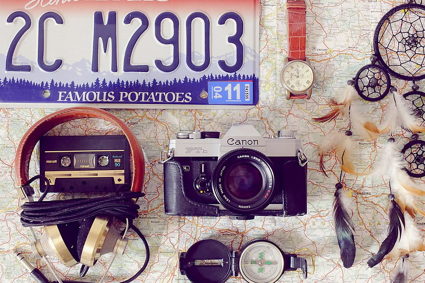 Vintage Travel Flat Lay with Camera, Map, and Accessories