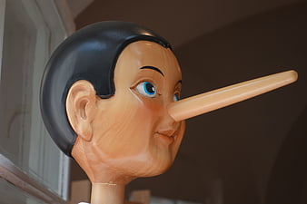 Close-up of Pinocchio Wooden Puppet Head with Long Nose