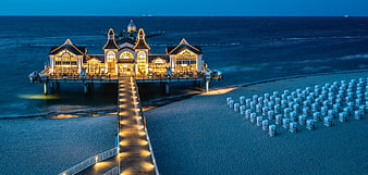 Aerial View of Illuminated Sellin Pier and Beach Cabins at Dusk