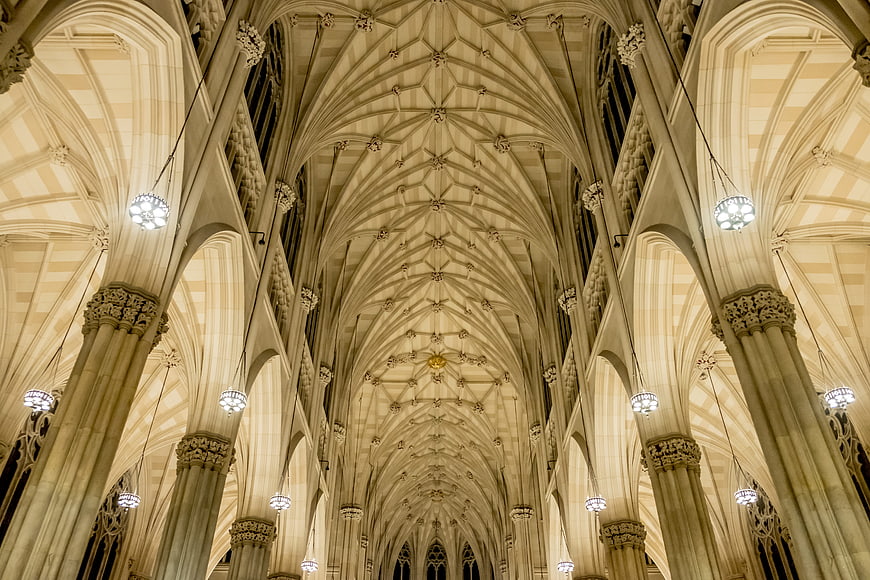 Gothic Cathedral Interior With Vaulted Ceiling And Stone Pillars