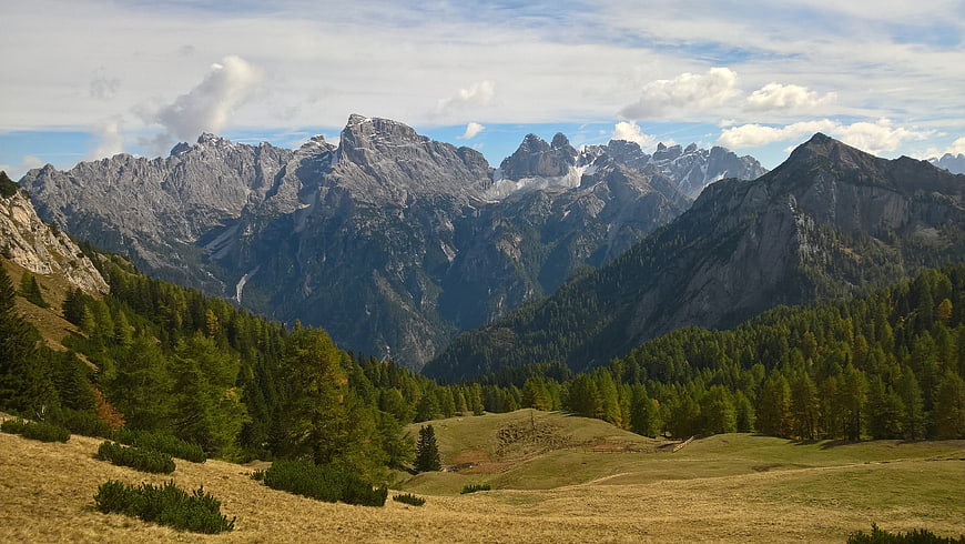 Panoramic Dolomites Mountain Landscape with Forest and Meadow
