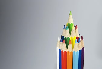 Colorful Pencils Arranged on Gray Background