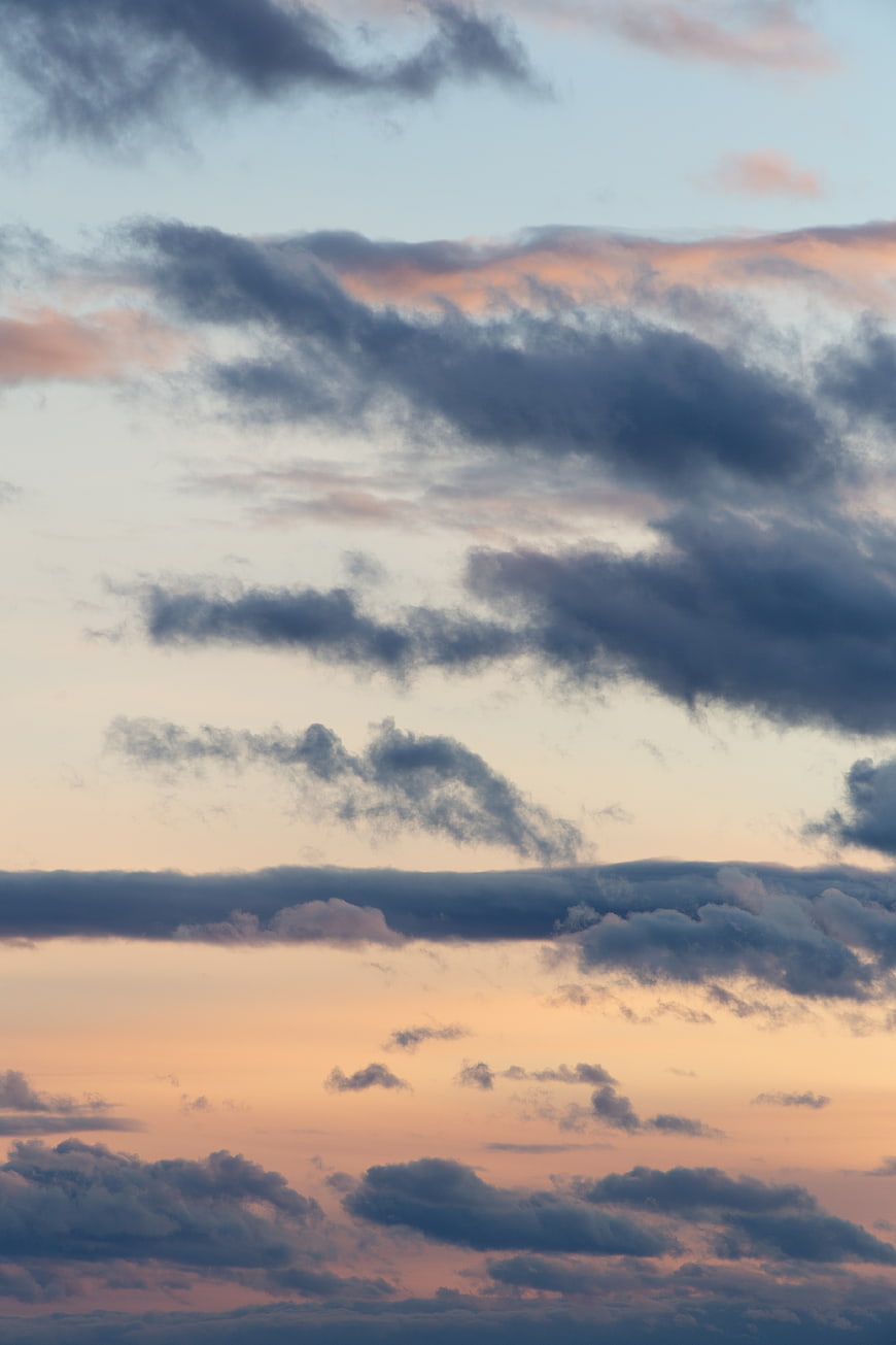 Dramatic Sunset Sky with Pink and Blue Clouds