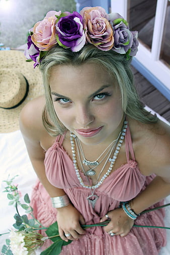 Young Woman with Flower Crown and Pink Dress