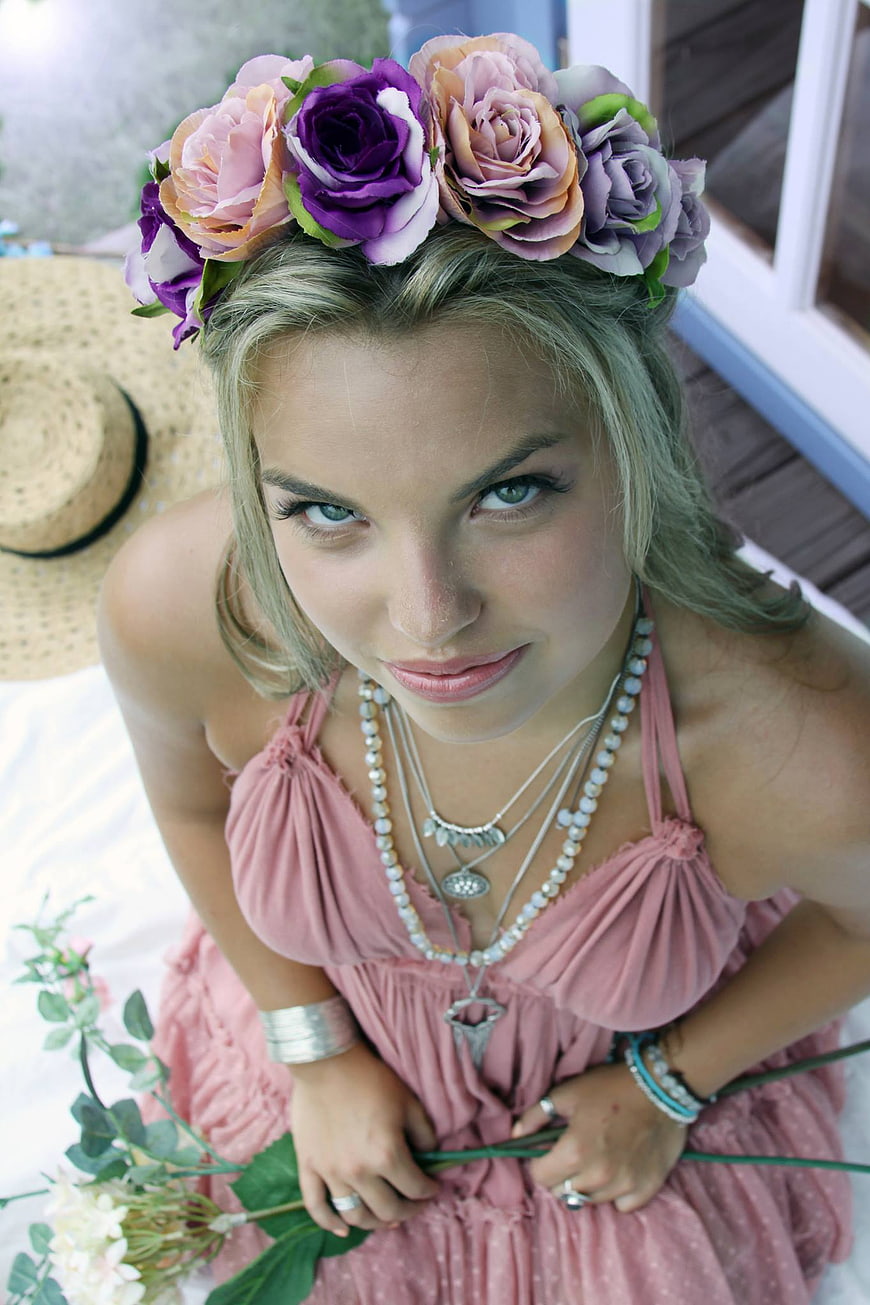 Young Woman with Flower Crown and Pink Dress