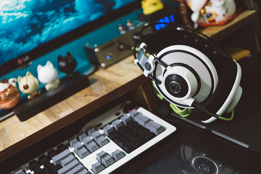 Gaming Setup with Headphones and Mechanical Keyboard