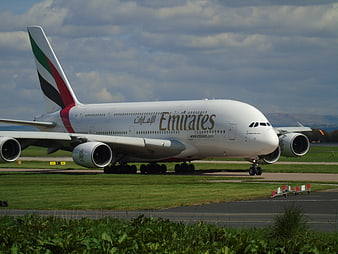 Emirates Airbus A380 taxiing on airport runway