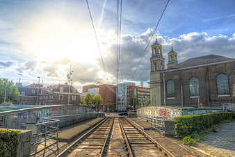 Tram tracks leading to church in Amsterdam Waterlooplein