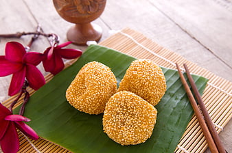 Traditional Malaysian Sesame Balls on Banana Leaf