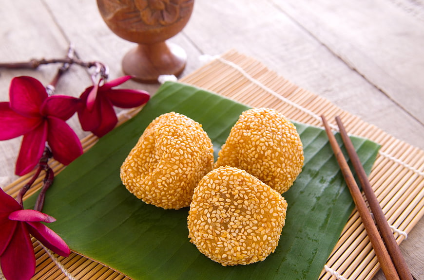 Traditional Malaysian Sesame Balls on Banana Leaf
