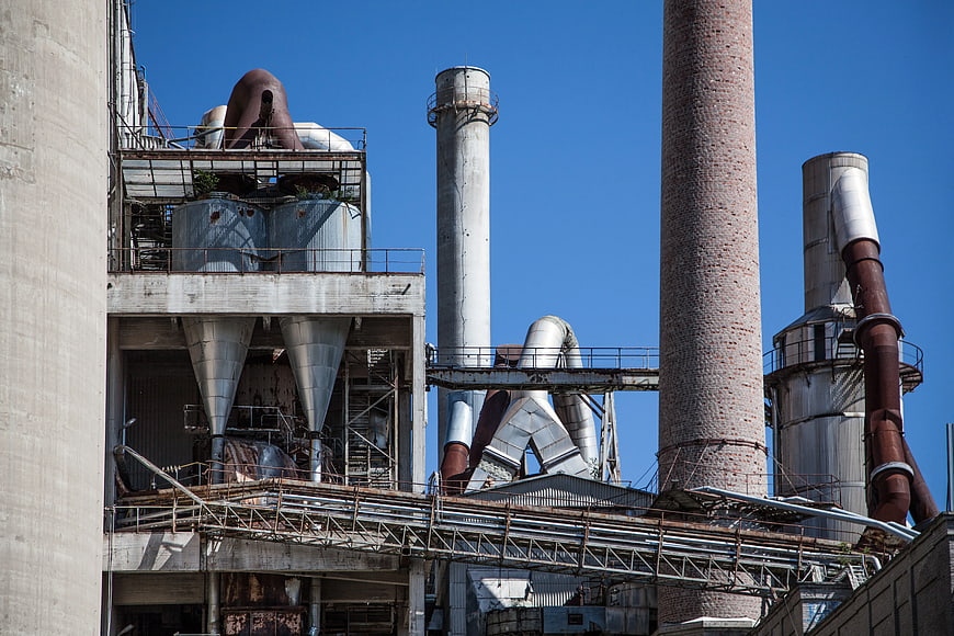 Abandoned Industrial Factory Complex with Smokestacks