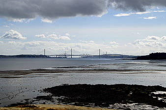 Forth Bridge Landscape View From Scottish Shoreline At Low Tide