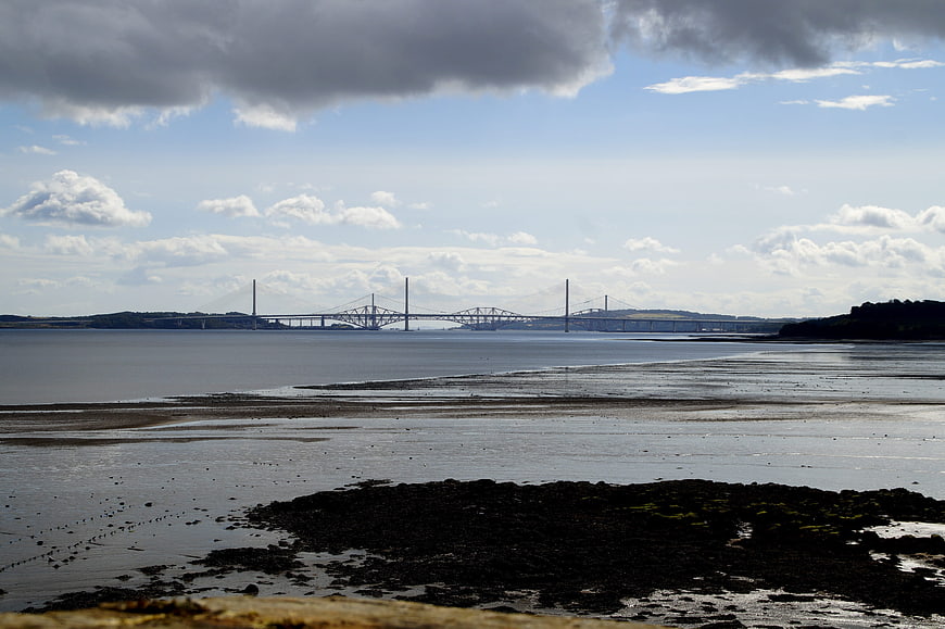 Forth Bridge Landscape View From Scottish Shoreline At Low Tide