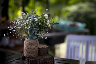 Rustic White Flower Bouquet in Twine-Wrapped Jar on Wood