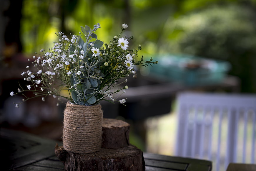 Rustic White Flower Bouquet in Twine-Wrapped Jar on Wood