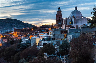 Historic Mexican Town at Twilight with Cathedral and Mountain