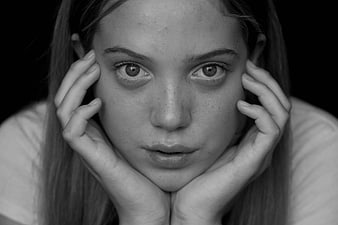 Intense Black and White Portrait of Young Woman with Freckles