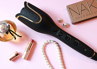 Black Hair Curling Wand Flat Lay with Makeup and Pearls
