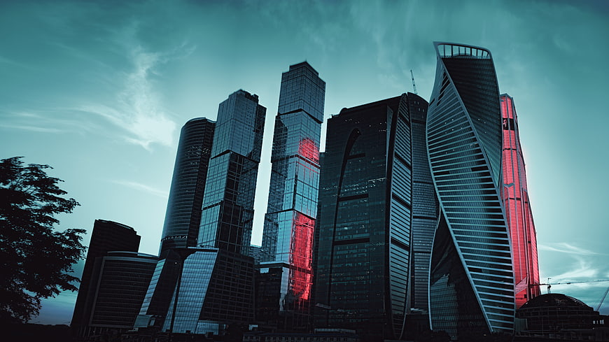 Moscow City Skyscrapers with Red Reflections at Dusk