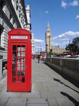 Red telephone booth with Big Ben in London