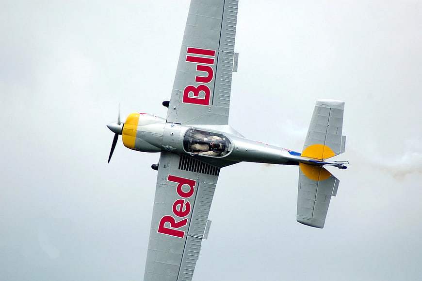 Red Bull Aerobatic Plane in Vertical Flight