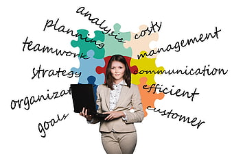 Businesswoman with laptop and puzzle pieces representing strategy and teamwork