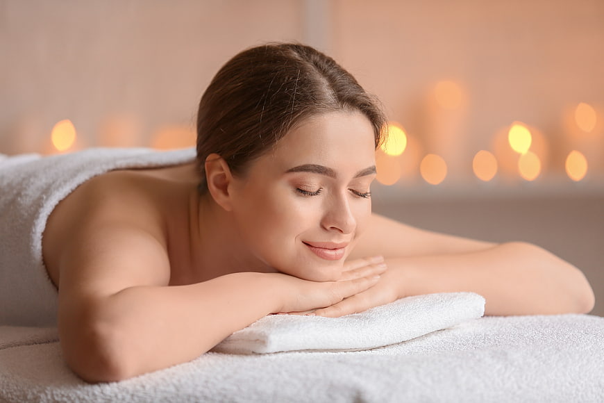Relaxed Woman Receiving Spa Massage Treatment