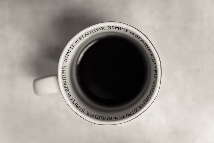 Top View of White Coffee Mug with Inspirational Quote