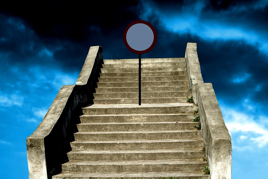 Concrete Staircase Leading To Blue Sky With Prohibition Sign