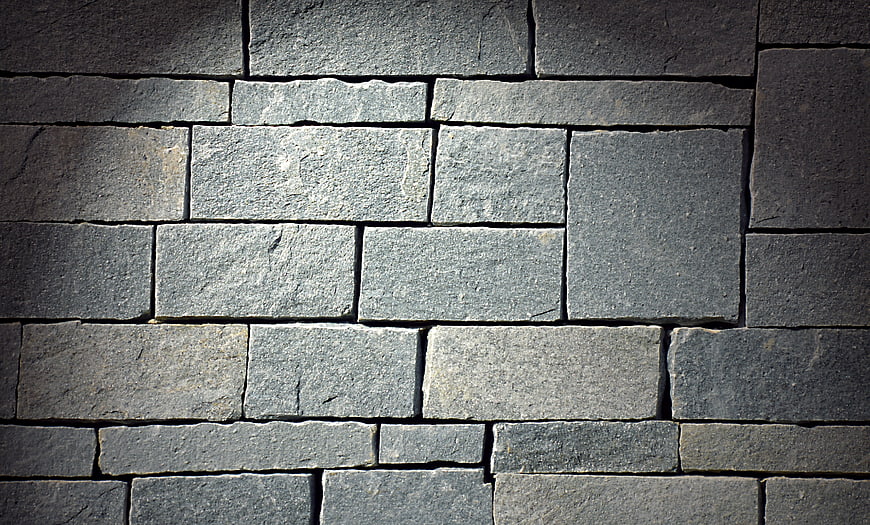 Textured Grey Slate Stone Wall Surface Background