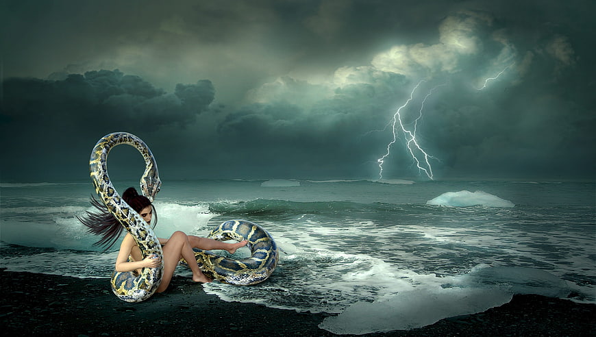 Woman with Giant Snake on Stormy Beach