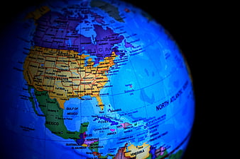 Close-up of a globe map highlighting North America and the United States