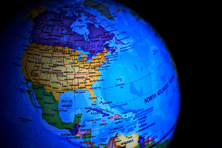 Close-up of a globe map highlighting North America and the United States