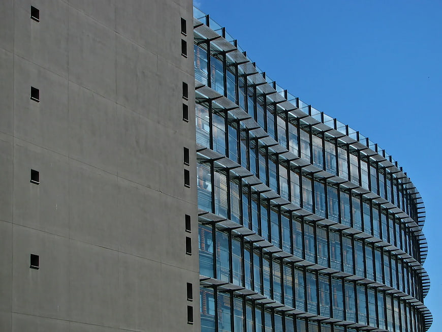 Modern Concrete and Glass Architecture Against Blue Sky