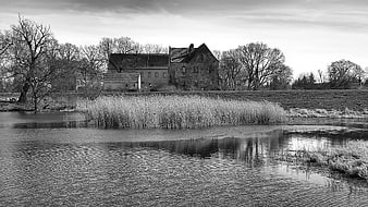Black and white landscape of Castle Klöden by a river