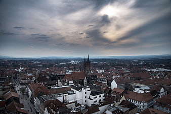 Aerial View of Göttingen Cityscape with Dramatic Clouds