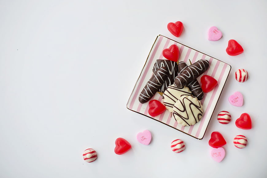 Valentine's Day Chocolates and Heart Candies on White Background
