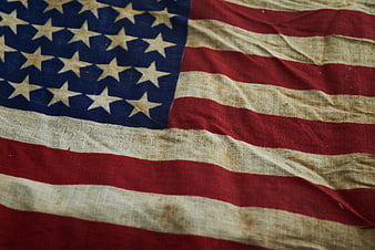 Close-up of vintage worn American flag fabric texture