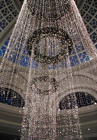 Grand cascading silver Christmas lights in hotel lobby