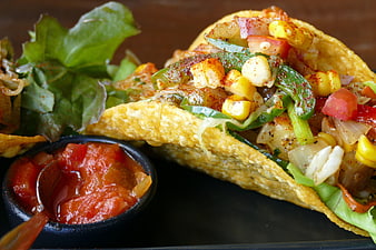 Close-up of Spicy Mexican Tacos with Corn and Salsa