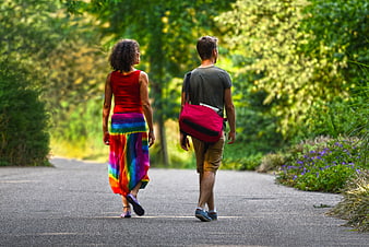 Couple Walking Away on Country Road in Summer
