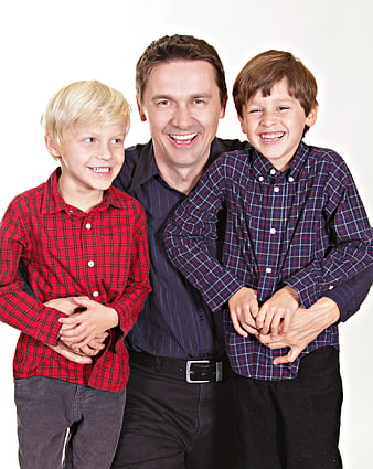 Happy Father And Two Sons Family Portrait On White Background