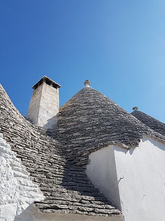 Traditional Trulli Conical Roofs in Alberobello, Italy