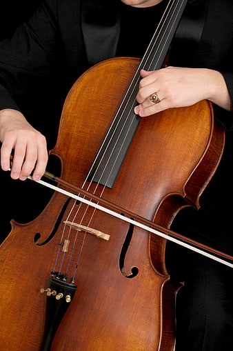 Close-up of Cellist Playing Cello with Bow