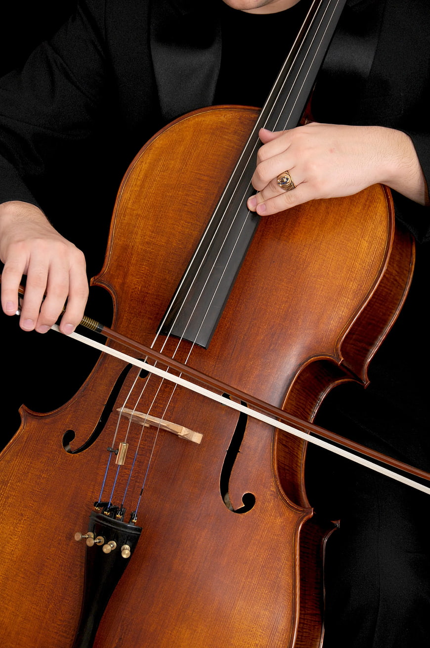 Close-up of Cellist Playing Cello with Bow