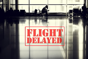 Flight Delayed Text Overlay On Silhouette Of Tired Passenger In Airport Terminal